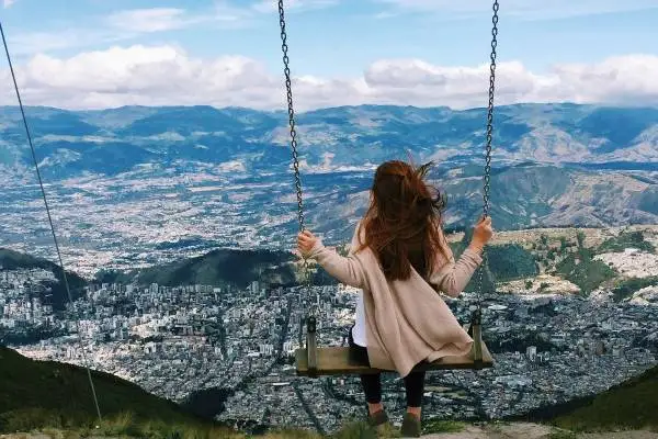 Panoramic photography spots at Cruz Loma Quito Cable Car viewpoint overlooking the city