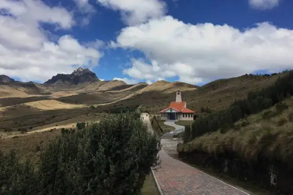 Hikers on the trail from Cruz Loma to Rucu Pichincha volcano summit near Quito Ecuador