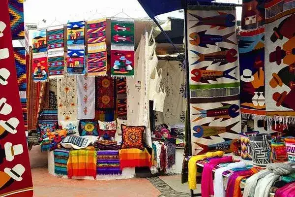 Otavalo market otavalo ecuador haggling for handicrafts