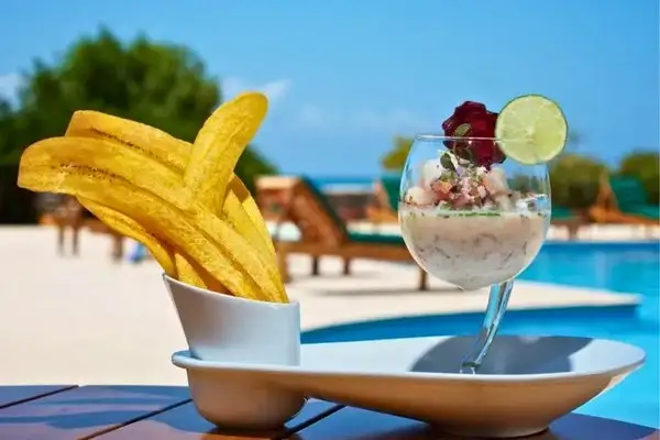 Ceviche and plantain chips served poolside in the Galapagos Islands