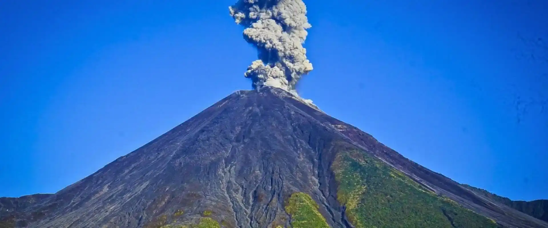 Reventador volcano rising above the Amazon foothills of Ecuador