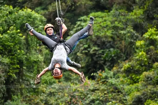 Tourists ready for Mindo zipline safety harness Ecuador