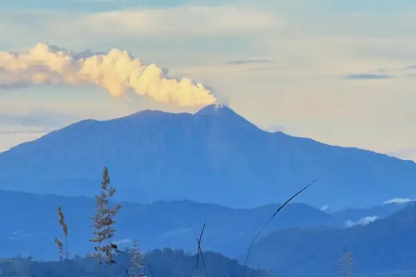 Reventador Volcano erupting in Ecuador with lava and ash clouds